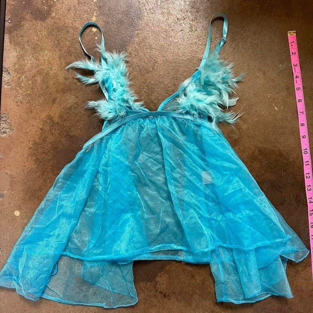 vintage-inspired Coquette lingerie dress in a‎ vibrant turquoise blue